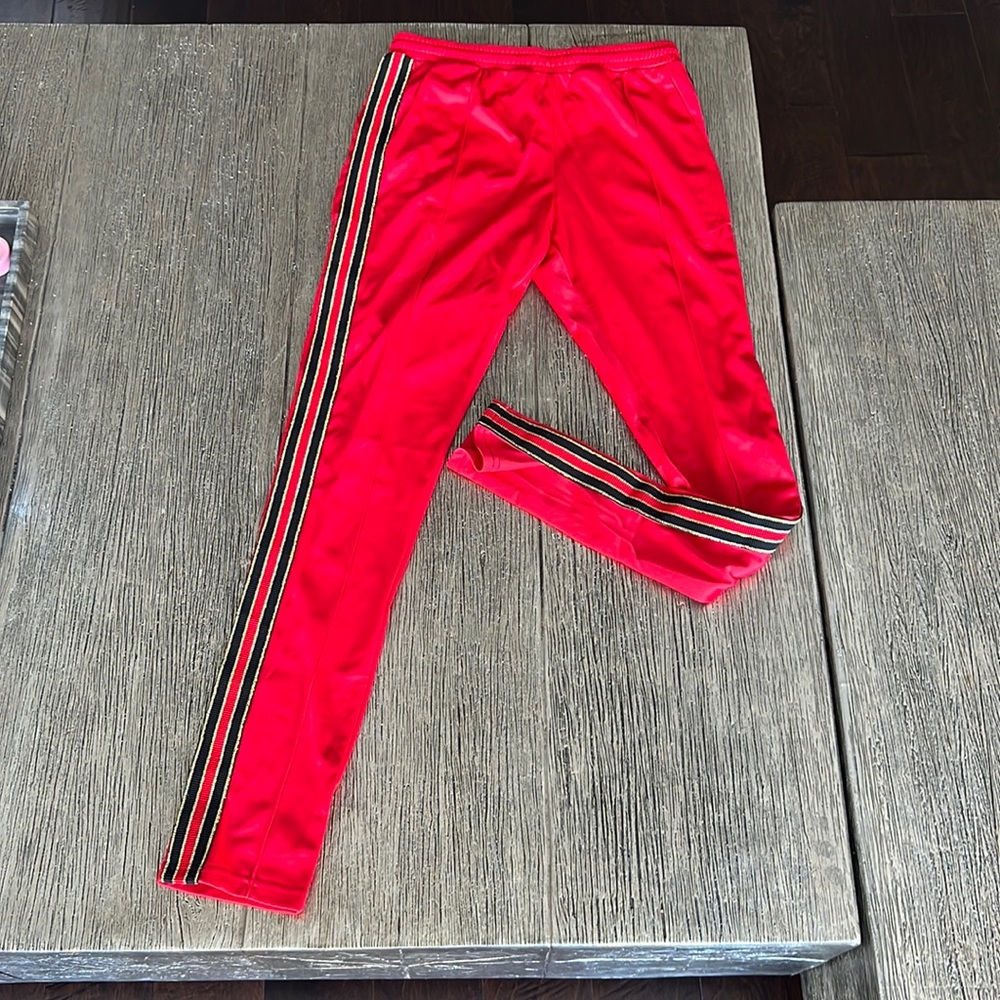 serenade M track pants red black and gold stripe
